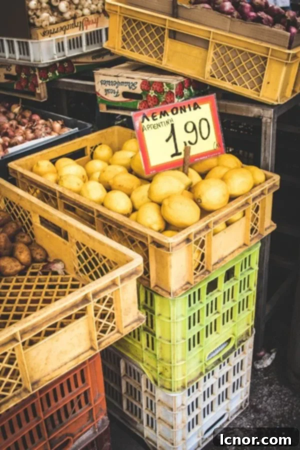 Athens Central Food Market: 10 Must-Visit Reasons 12 Lemons for sale in a crate at the Central Market in Athens Greece, bright and fresh.