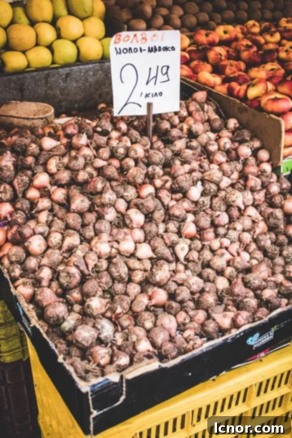Athens Central Food Market: 10 Must-Visit Reasons 13 Bundles of baby onions at the market, looking fresh and ready for sale.
