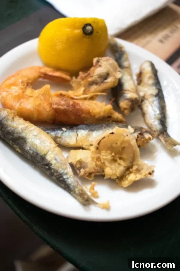 Athens Central Food Market: 10 Must-Visit Reasons 10 A plate of freshly prepared seafood or meat dish, likely from one of the market's eateries.