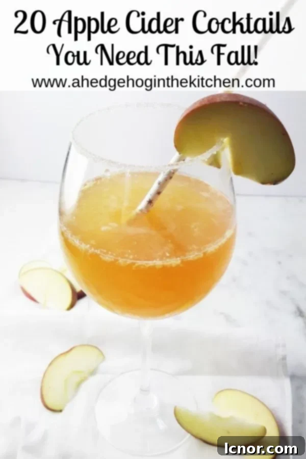 A vibrant cocktail featuring apple cider, garnished with fresh apple slices and cinnamon sticks, perfect for autumn evenings.