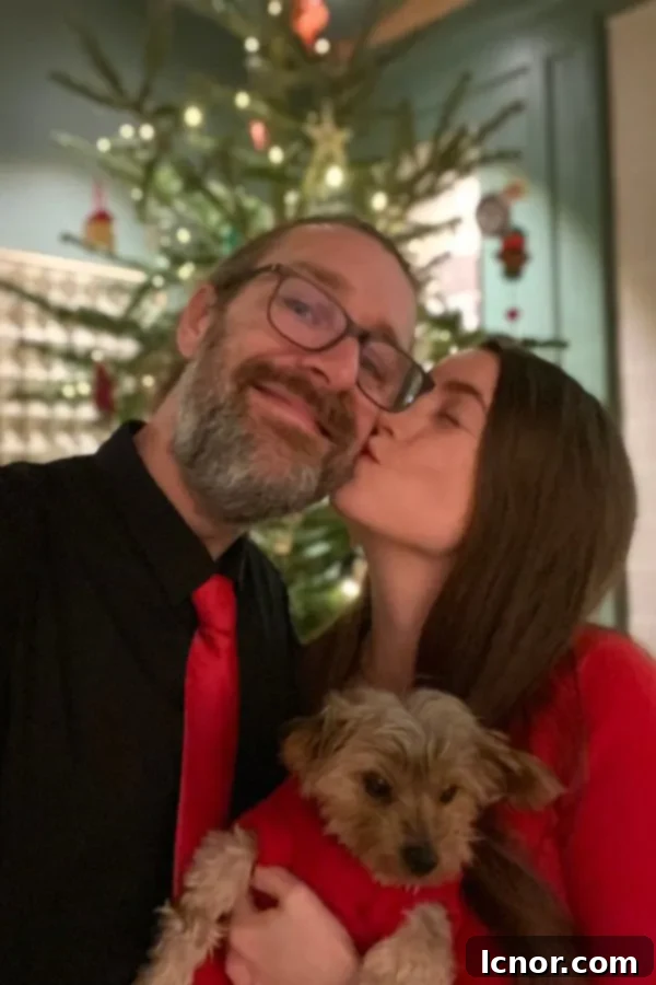 Meaningful Christmas Moments: Couple's Traditions 8 Couple decorating their Christmas tree together, symbolizing the joy of creating shared memories.